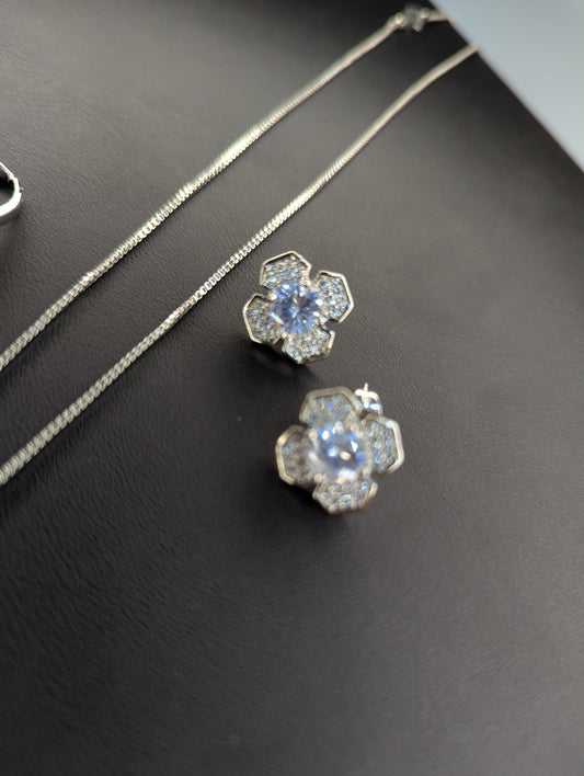 Elegant Silver-Tone Flower Jewelry Set with Sparkling Crystals (Necklace, Earrings & Ring)  Product Description: